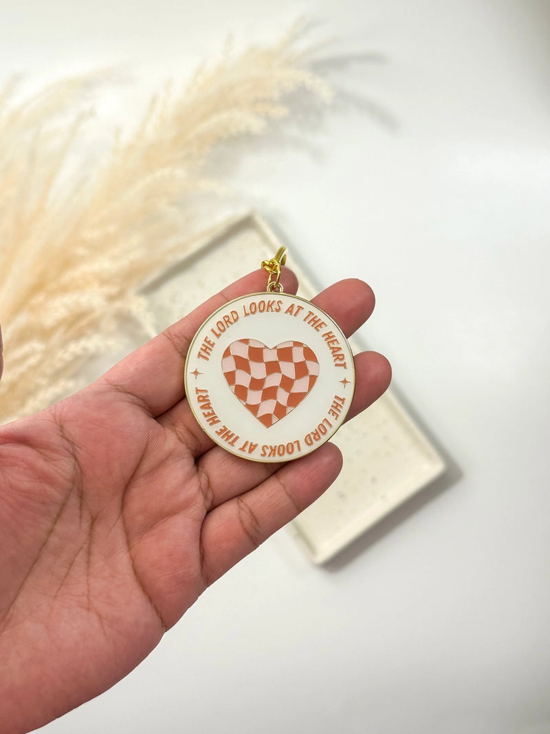 Looks at the Heart Keychain