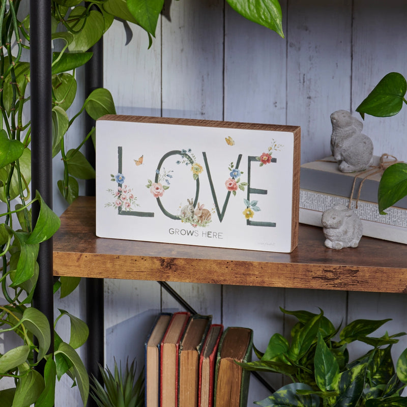 Love Grows Here Sign