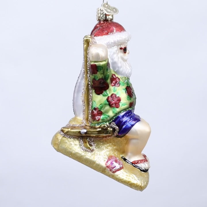 Sunning Santa Ornament